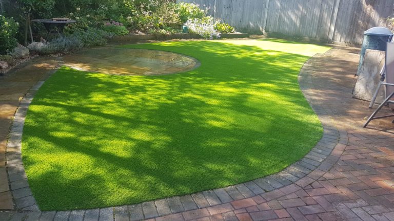 Back garden artificial grass installation in Reading