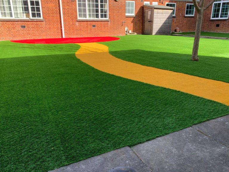Yellow artificial grass path