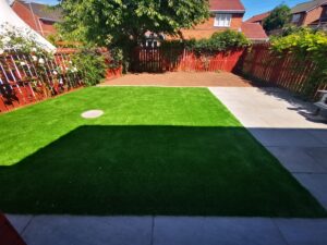 artificial lawn with house shadow