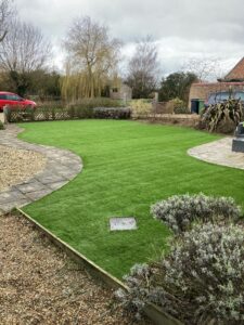 new artificial lawn with snaking path