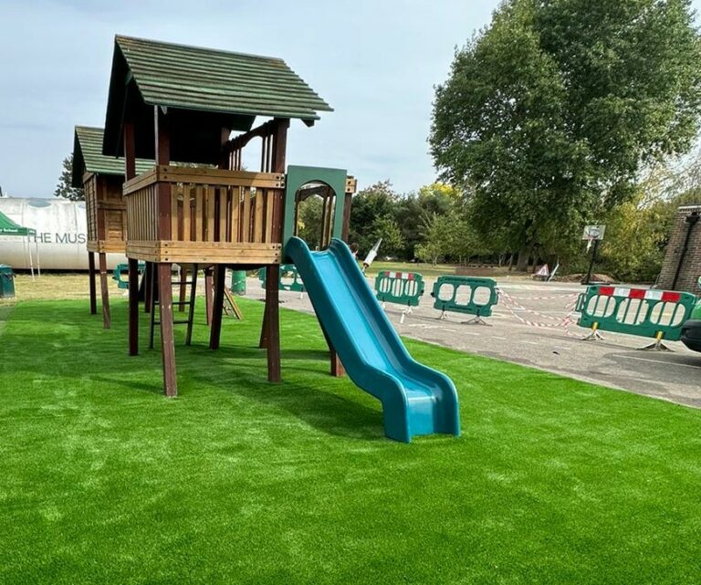 playhouse with artificial grass surroundings