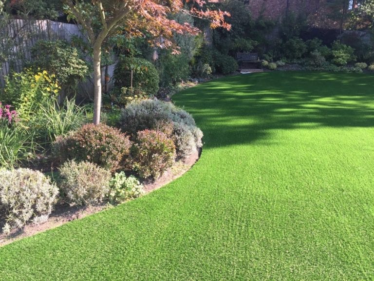 Fake grass with curved flower borders