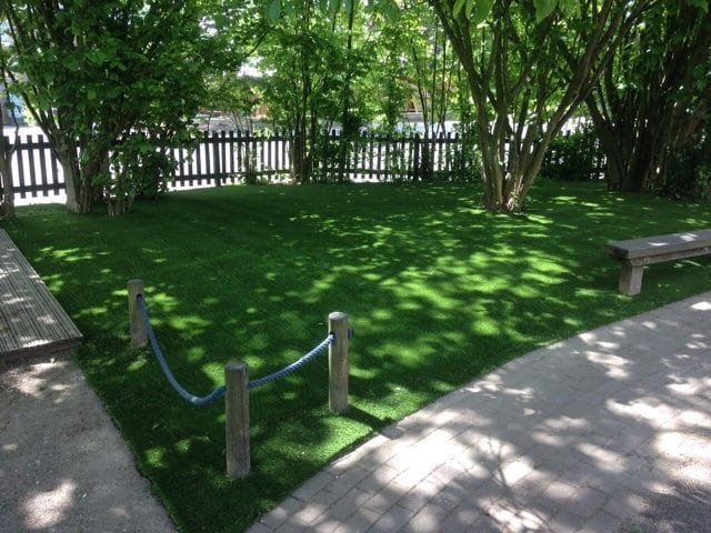 School play area with artificial grass